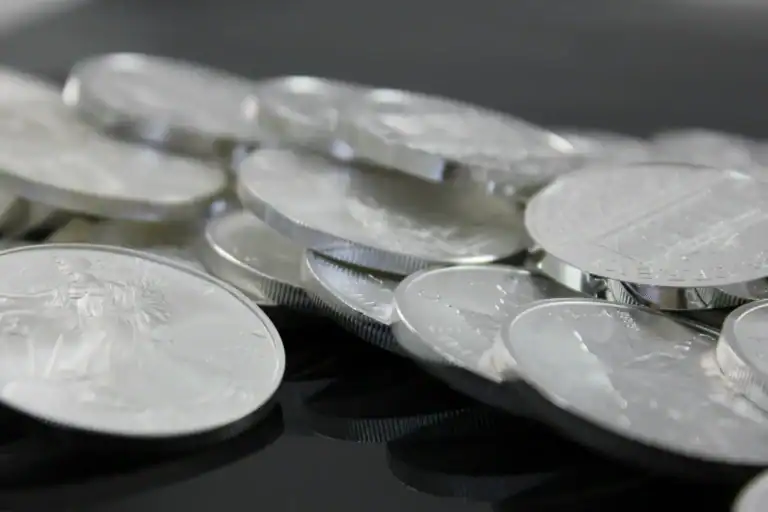 Silver Coins Nearing Record High - Silver Coins on a table