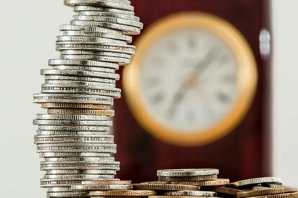 What Happens If You Go Over the ISA Limit Connotation With Coins and a Clock