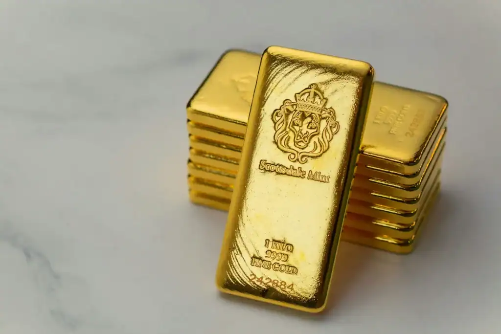 goldman sachs gold price increase - gold bars stacked denoting this